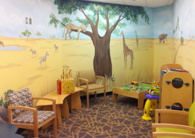 Safari mural with leppard giraffes and zebras in Loudoun medical waiting area in Dulles, VA