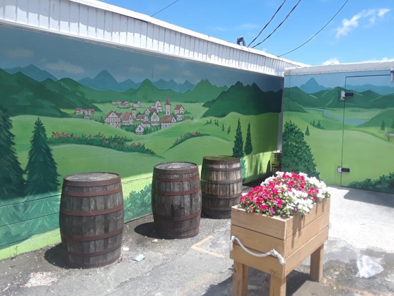 outdoor mural with German village in Alexandria VA